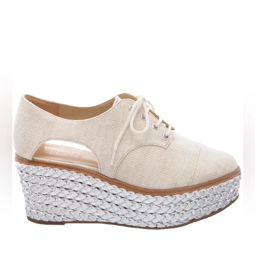 SCHUTZ Cream Lace-Up Platform Wedges with Silver Braided Sole
